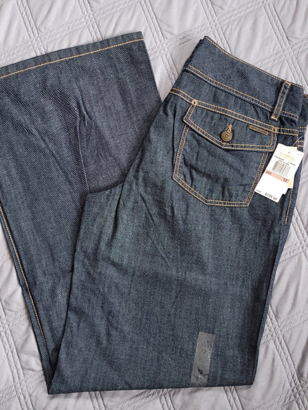 New MICHAEL KORS jeans-low rise, wide leg, darker rinse jeans.